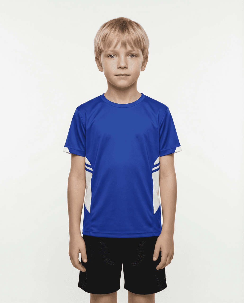A boy wearing a blue T-shirt with white accents, paired with black shorts. The shirt has a logo.