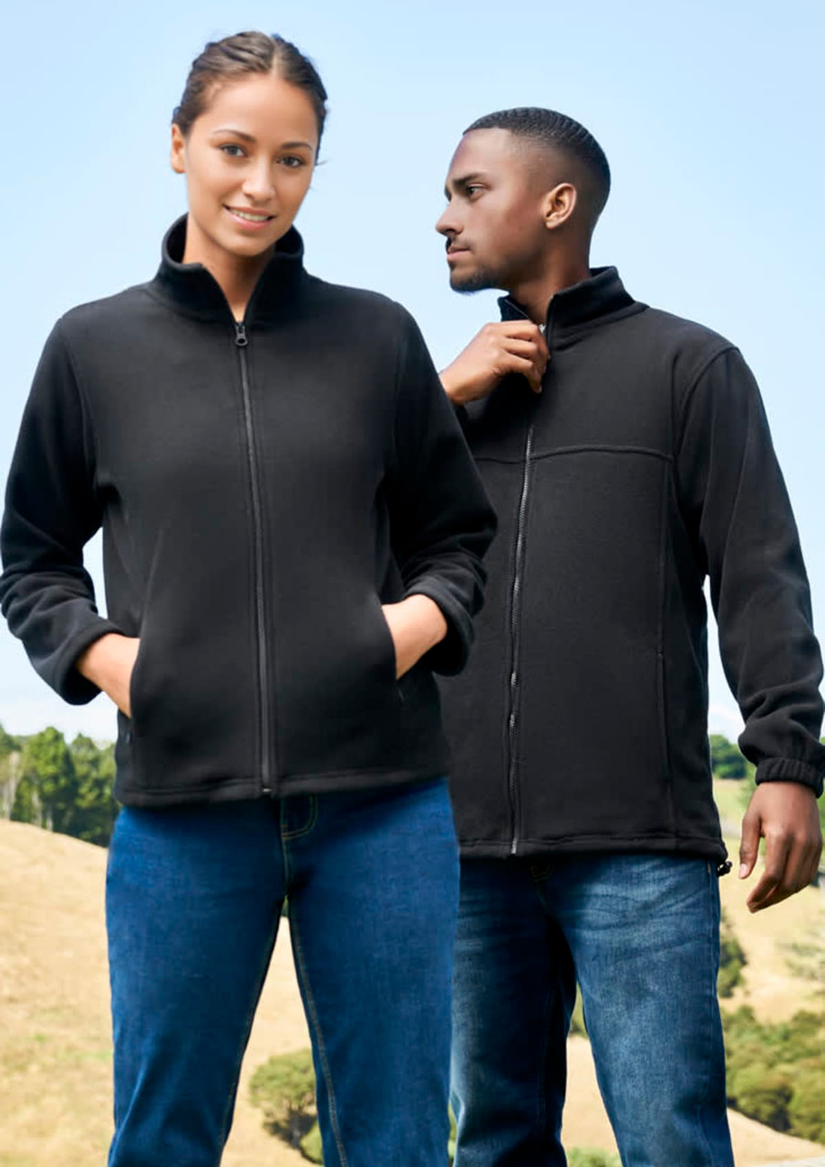 A black micro fleece jacket featuring a zip front and side pockets, worn by a man and woman outdoors.