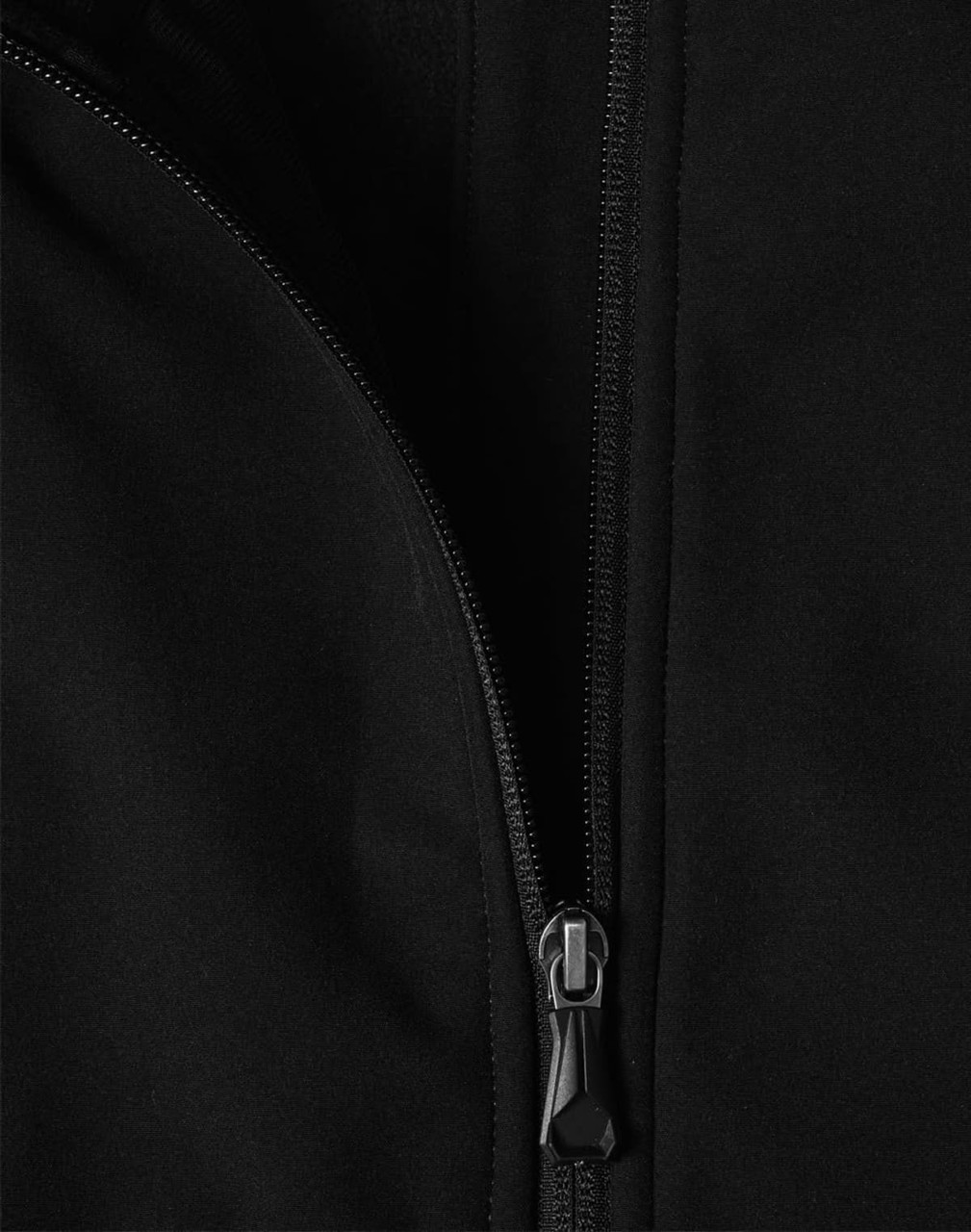 A black softshell jacket featuring a zippered front and a smooth fabric texture. The jacket has a logo.