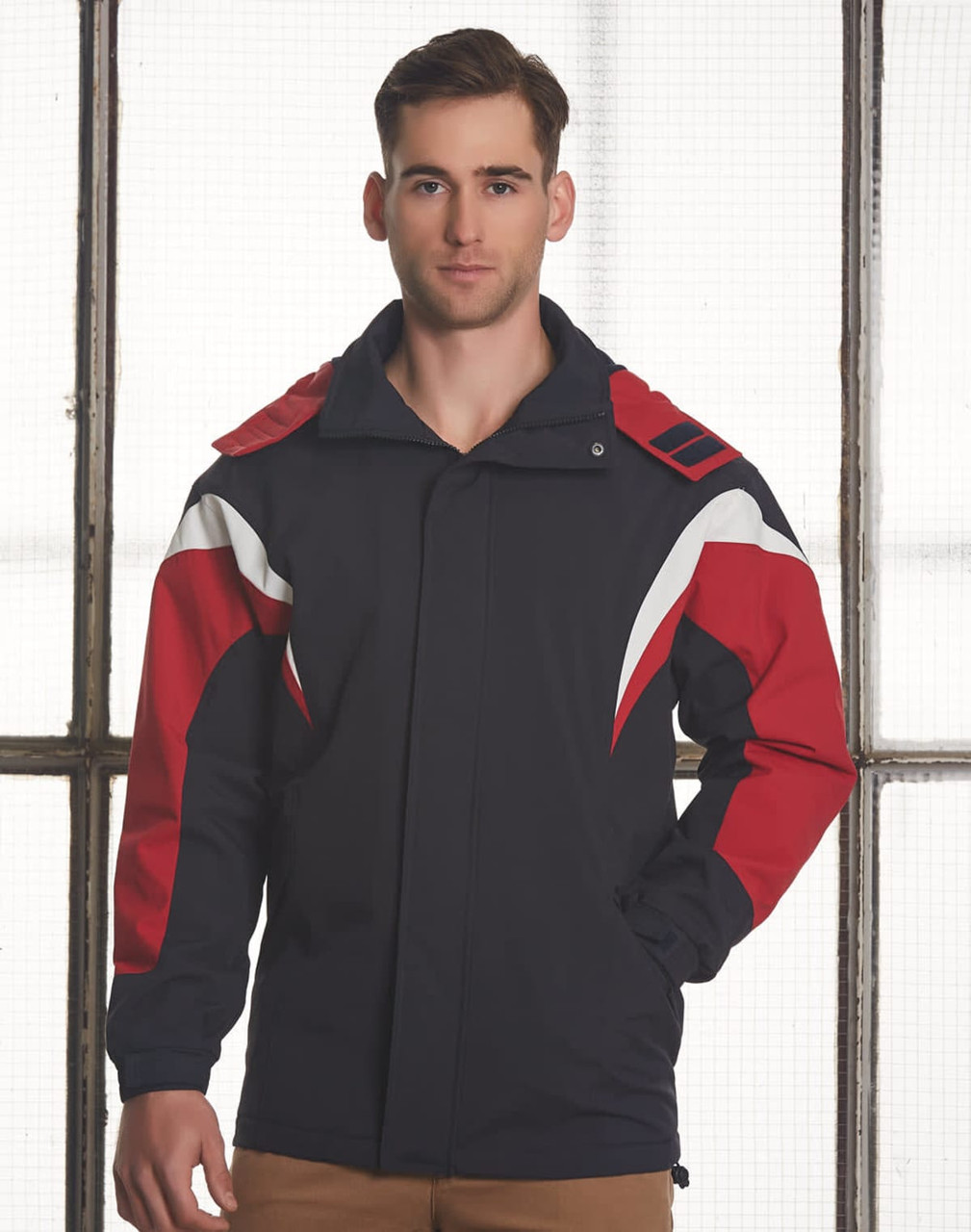 A tri-colour jacket with a hood featuring navy, red, and white accents, designed for men's outerwear.