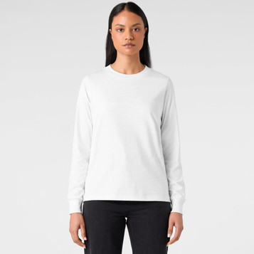 A long-sleeve white T-shirt featuring a logo, styled with a simple design and paired with black jeans.