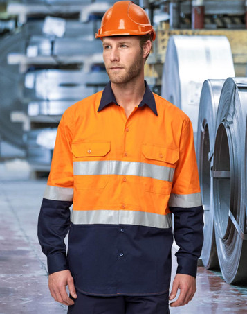 A safety long-sleeve shirt in hi-vis orange and navy with reflective tape, worn with a hard hat.