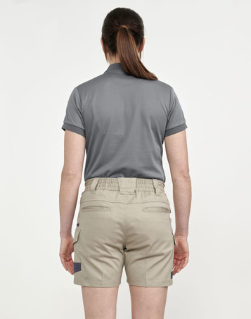 A pair of unisex cotton stretch drill work shorts in khaki, featured with a back view of a person wearing them.