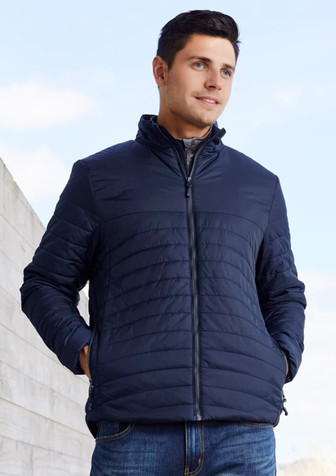A men's puffer jacket in navy blue, featuring a zip front and standing collar, worn by a model outdoors.