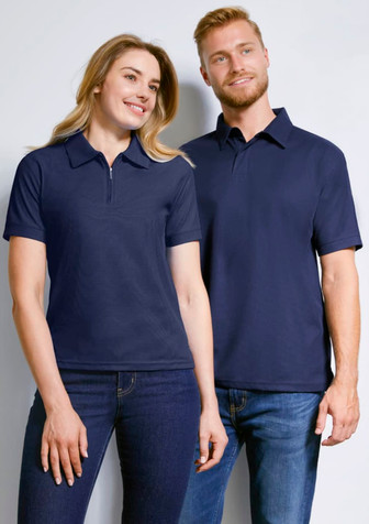 A women's short sleeve polo shirt in navy, featuring a classic collar and a logo. Styled alongside a men's polo shirt.