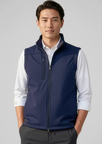 A navy men's softshell vest featuring a zip closure and high collar, worn over a white shirt.