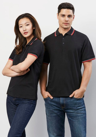 A black short sleeve polo shirt featuring red and white trim, displayed on a male and female model. The shirt has a logo.