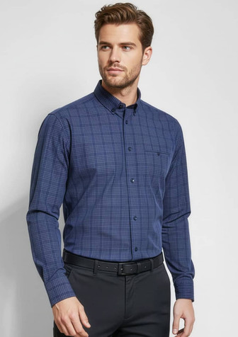 A men's long sleeve shirt in navy blue with a checked pattern and a chest pocket, featuring a logo.
