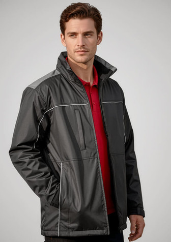 A man models a black unisex reactor jacket with grey accents, featuring zip pockets and a collar.