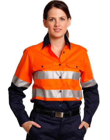 A women's long-sleeve safety shirt in bright orange with silver reflective tape and navy blue accents. Features a logo.