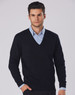A black V-neck wool and acrylic knit jumper worn over a blue collared shirt, featuring a branding logo.