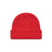A bright red beanie with a ribbed texture and folded cuff. It features a logo on one side.