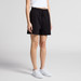 Black sports shorts with an elastic waistband, featured on a model standing against a neutral background.