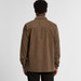 A cord shirt in brown, featuring a button-up design and a logo on the back.