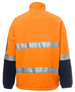 A bright orange polar fleece jacket with reflective stripes and navy blue sleeves, featuring a logo on the sleeve.