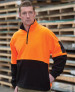 An orange and black polar fleece sweatshirt with a half-zip collar and a logo on the chest.