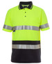 A high-visibility polo shirt in bright yellow with black and silver reflective stripes and a pocket. It features a logo.