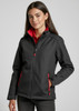 A fitted black jacket with red accents, featuring zippered pockets and a high collar, modelled by a young woman.