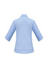 A light blue women's 3/4 sleeve shirt with a button-up design and a small logo on the back.