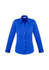 A women's long sleeve button-up shirt in bright blue, featuring a classic collar and button front.