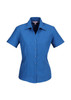 A blue short sleeve button-up shirt with a collar and six buttons down the front. It features a logo.