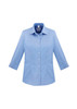 A light blue women's button-up shirt featuring 3/4 sleeves and a collar, with a logo on the chest.