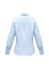 A light blue women's long sleeve button-up shirt with a classic collar and cuffed sleeves. Features a logo.