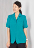 A short-sleeved, teal overblouse with a button front and a chest pocket, displayed on a model.