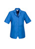 A blue short-sleeved overblouse with a collar, featuring a front pocket and a button closure. Includes a brand logo.