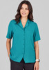 A teal overblouse with short sleeves, featuring a button-up front and a single chest pocket.