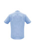 A light blue short sleeve button-up shirt with a back yoke and collar. Features a logo on the upper back.