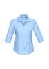 A light blue women's button-up shirt with 3/4 sleeves and a collar. It features a logo on the design.