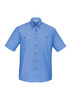 A light blue chambray short sleeve shirt with button closures and two chest pockets, featuring a logo.