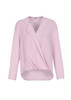 A light pink women's blouse with a hi-lo hem and long sleeves, featuring a wrap design and a logo.
