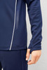 A navy blue unisex mid-layer top featuring a textured design and a logo. The top has an athletic fit and long sleeves.