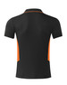 A black polo shirt with orange side panels, featuring a collar and short sleeves, and a visible brand logo.