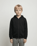 A black zip hoodie for kids, featuring a hood and front pockets, displayed on a child standing against a plain background.
