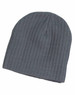 A cable knit beanie in a dark grey colour, featuring a ribbed texture and a logo on the side.