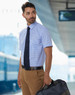 A men's short-sleeve button-up shirt in blue gingham check, paired with a tie and brown trousers. A bag is being held.