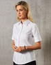 A white women's short-sleeve button-up shirt with a fitted silhouette. It has a collar and subtle branding.