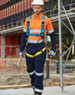 A Hi-Vis men's lightweight cotton coverall in orange and navy, featuring 3M tape and a harness.