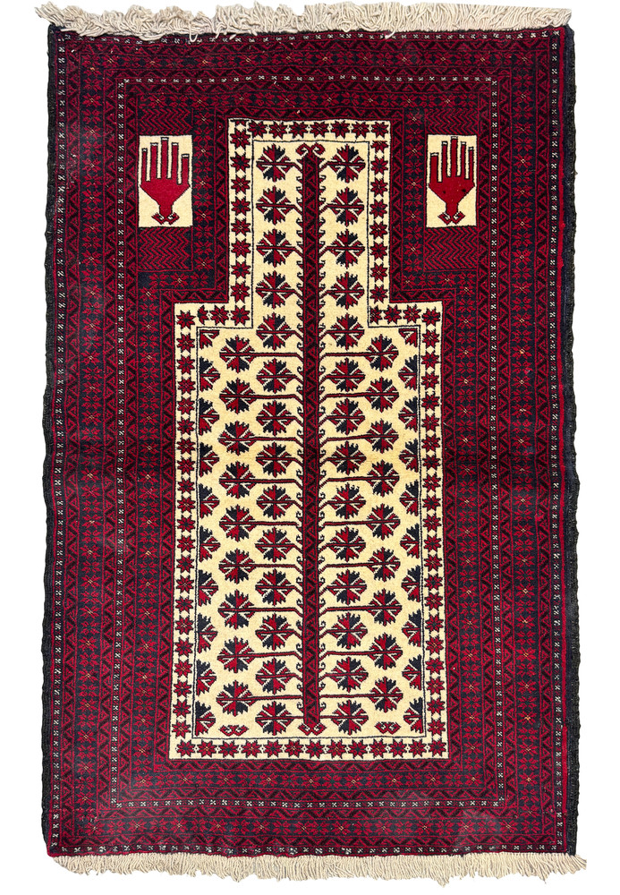 A 3'2" x 4'6" Persian Baluch Prayer Rug with navy blue field and vivid red mihrab A 3'2" x 4'6" Persian Baluch Prayer Rug with navy blue field and vivid red mihrab