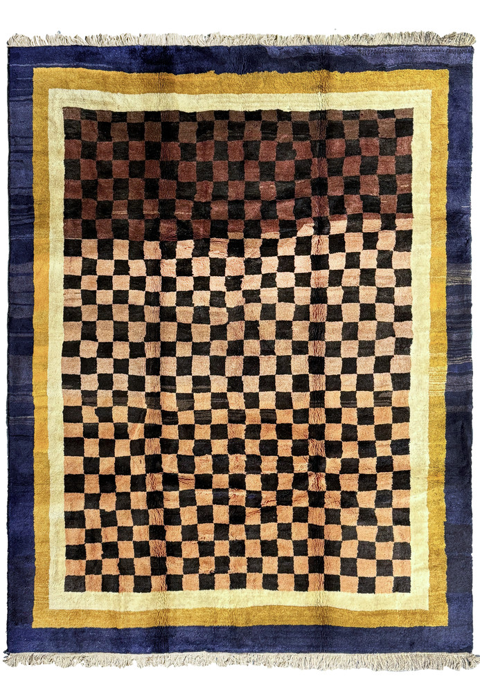 A modern 9x12 Nepal rug with a distinctive checkerboard pattern in espresso brown and beige, bordered by indigo and golden yellow edges A modern 9x12 Nepal rug with a distinctive checkerboard pattern in espresso brown and beige, bordered by indigo and golden yellow edges