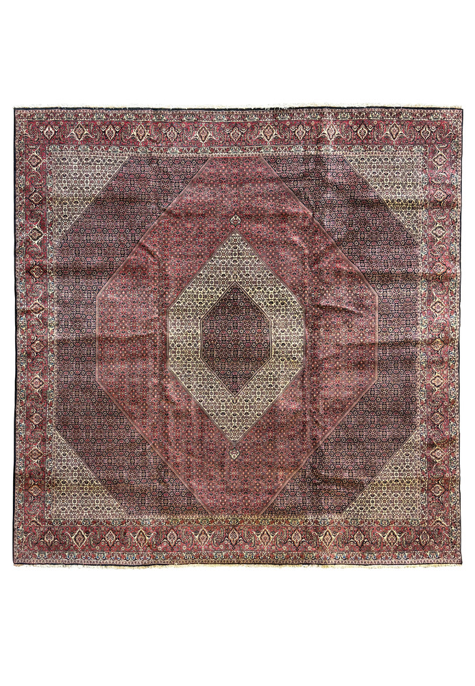 Full view of a grand 13 x 13 Persian Bijar square rug laid out to showcase its rare size and detailed geometric and floral designs in deep reds and blues Full view of a grand 13 x 13 Persian Bijar square rug laid out to showcase its rare size and detailed geometric and floral designs in deep reds and blues