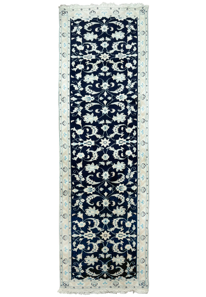 Full-length view of the Persian Nain Runner laid out flat, displaying the complete design and borders. Full-length view of the Persian Nain Runner laid out flat, displaying the complete design and borders.