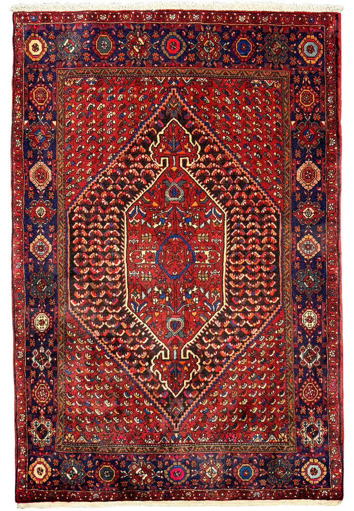 Detailed view of a 3x5 Persian Gholtogh rug, showcasing a rich red central field with intricate geometric and floral patterns in navy blue, ivory, and orange, bordered by dark blue with traditional Persian motifs Detailed view of a 3x5 Persian Gholtogh rug, showcasing a rich red central field with intricate geometric and floral patterns in navy blue, ivory, and orange, bordered by dark blue with traditional Persian motifs