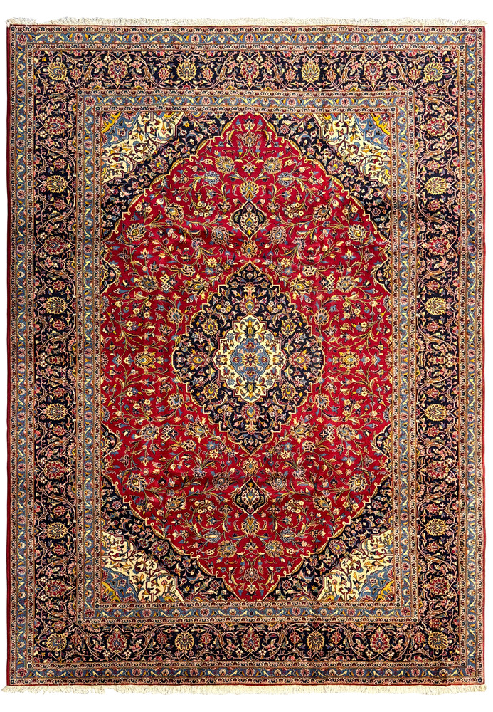 Full view of a 10 x 13'3 Persian Kashan Rug with intricate floral and vine motifs in rich red, navy blue, gold, and cream colors know from TV show Shark Tank Full view of a 10 x 13'3 Persian Kashan Rug with intricate floral and vine motifs in rich red, navy blue, gold, and cream colors know from TV show Shark Tank