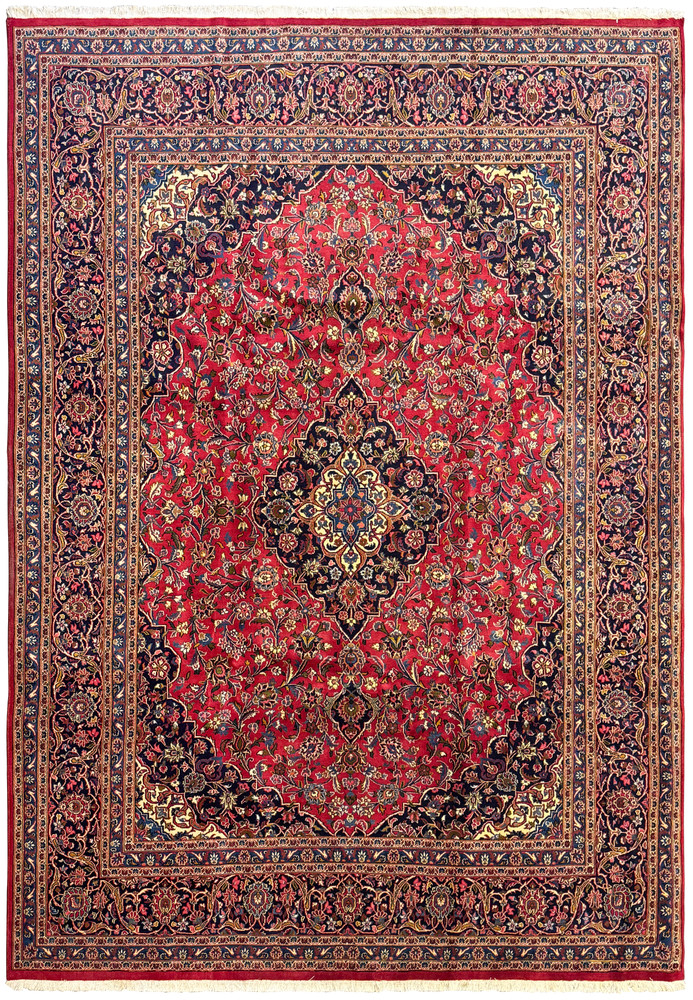 Full view of a 9'8 x 13'5 Persian Kashan Rug with intricate floral and vine motifs in rich red, navy blue, gold, and cream colors. Full view of a 9'8 x 13'5 Persian Kashan Rug with intricate floral and vine motifs in rich red, navy blue, gold, and cream colors.