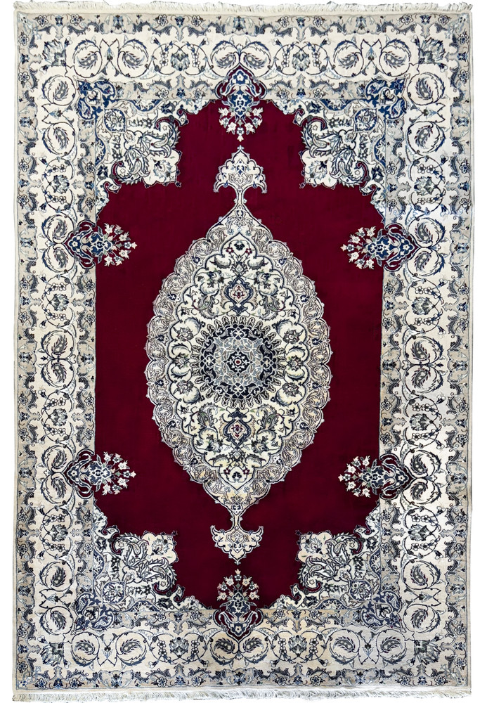 Full view of the 6'8 x 10'4 Persian Nain 9LAA Wool & Silk Rug, displaying the central medallion and surrounding floral patterns. Full view of the 6'8 x 10'4 Persian Nain 9LAA Wool & Silk Rug, displaying the central medallion and surrounding floral patterns.