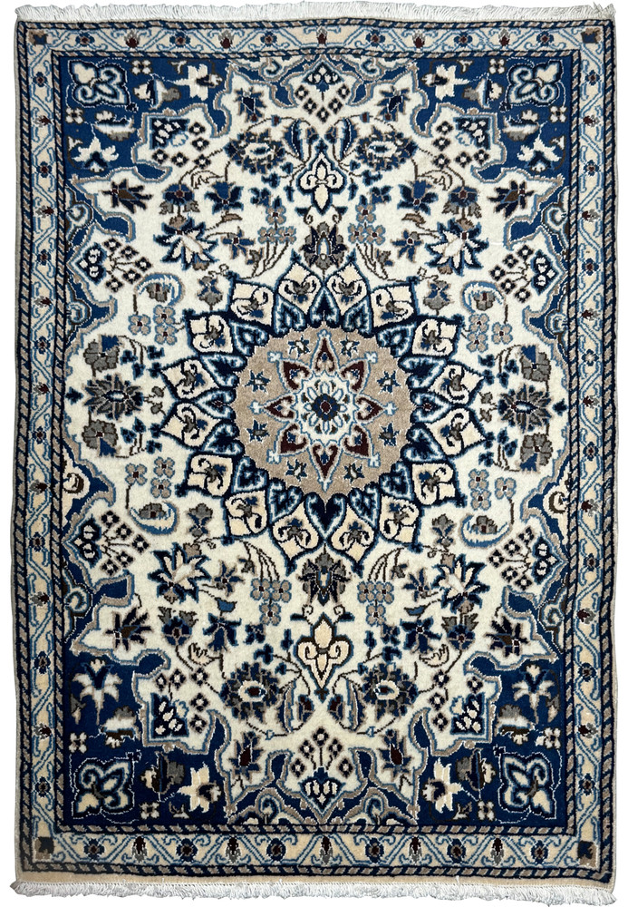Full view of the 2'11 x 4'5 Persian Nain rug with detailed floral patterns and central medallion, laid flat.